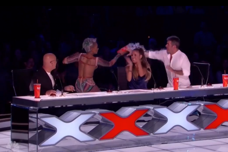 Mel B splits dress open throwing water over Simon Cowell after crude jibe about her marriage on America's Got Talent