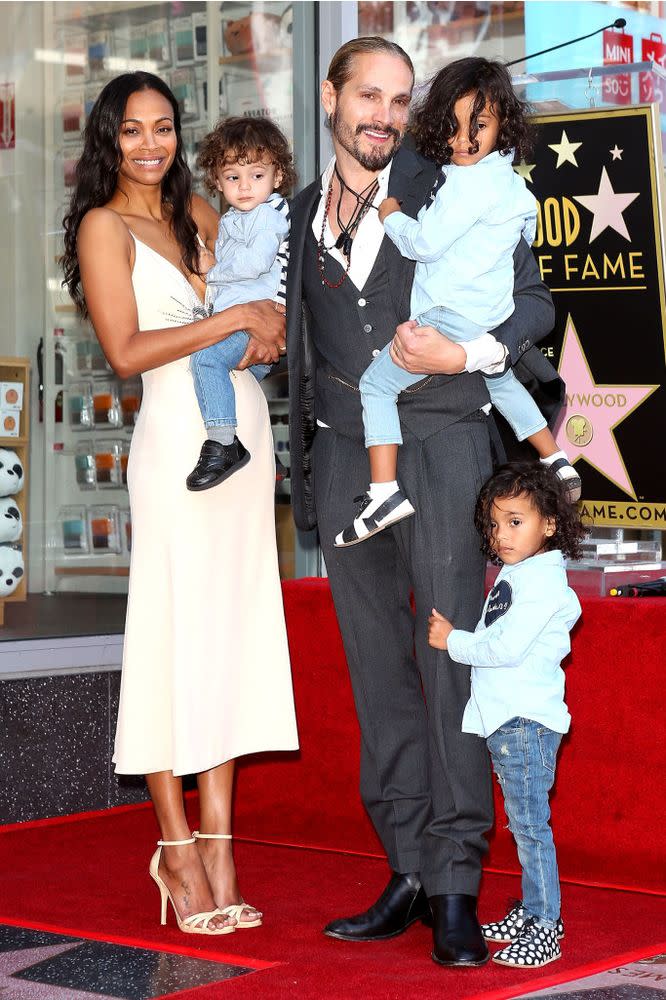 Zoe Saldana with her husband, Marco Perego, and their children: Zen, Bowie and Cy | Michael Tran/FilmMagic