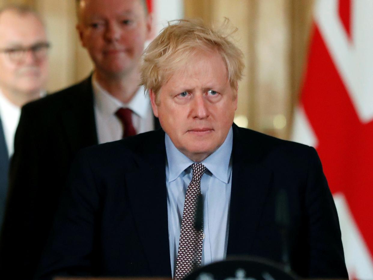 Britain's Prime Minister Boris Johnson, Chris Whitty, Chief Medical Officer for England and Chief Scientific Adviser to the Government, Sir Patrick Vallance, arrive for a news conference on the novel coronavirus, in London, Britain March 3, 2020. Frank Augstein/Pool via REUTERS