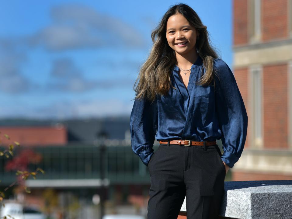College of the Holy Cross student, Phoebe Wong, who recently spoke at the White House Conference on Hunger, Nutrition, and Health, outside the Hogan Center Thursday,
