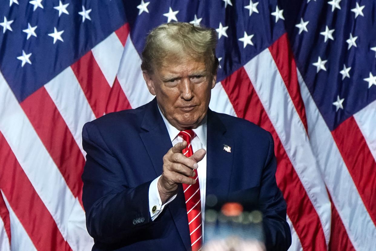 Former US President and 2024 presidential hopeful Donald Trump gestures to the crowd after speaking at a campaign event in Rome, Georgia, on March 9, 2024.