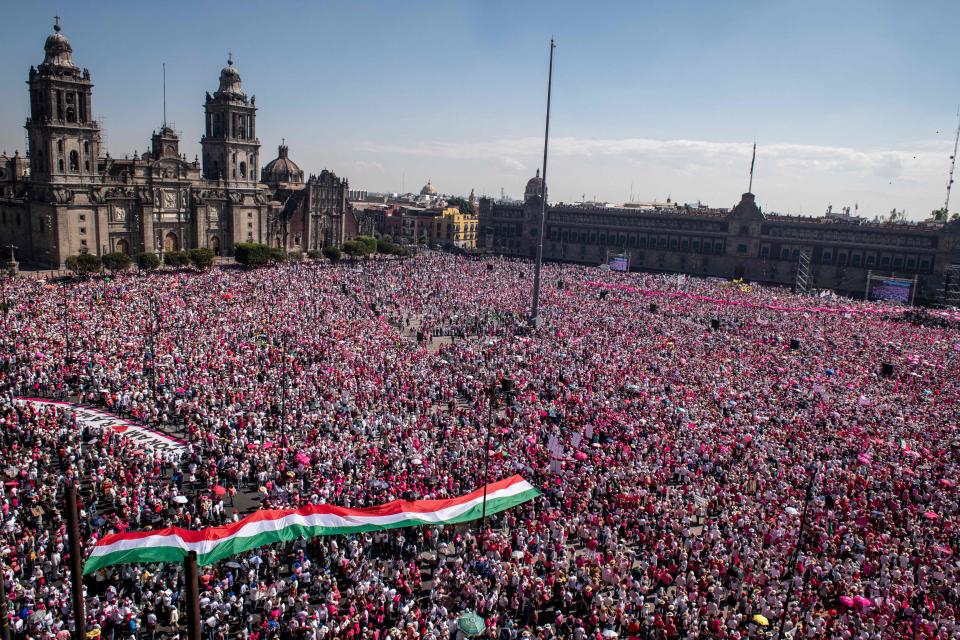 Thousands of opposition protesters gather to demonstrate against electoral reforms of the leftist ruling party involving the electoral system, at Zocalo square in Mexico City on February 26, 2023. - Opposition groups called for demonstrations in various cities in Mexico to reject a controversial electoral reform championed by President Andres Manuel Lopez Obrador that critics see as an attack on democracy ahead of key elections next year. The proposal aims to reduce the size and budget of the independent agency that organizes elections, the National Electoral Institute (INE). (Photo by Nicolas ASFOURI / AFP) (Photo by NICOLAS ASFOURI/AFP via Getty Images)