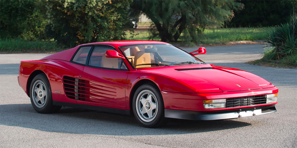 <p>Wedge-shaped looks, side louvers, and pop-up headlights are just some of the features on perhaps the most '80s Ferrari ever made, the Testarossa. It also has a flat-12 engine. No, not a V-12. <a href="https://www.roadandtrack.com/car-culture/a4497/go-car-culture-petrolicious-ferrari-bb/" rel="nofollow noopener" target="_blank" data-ylk="slk:A flat-12;elm:context_link;itc:0;sec:content-canvas" class="link ">A flat-12</a>. <a href="https://www.ebay.com/itm/1990-Ferrari-Testarossa/153894460578?hash=item23d4d31ca2:g:B~UAAOSwZDlehZz-" rel="nofollow noopener" target="_blank" data-ylk="slk:This one's;elm:context_link;itc:0;sec:content-canvas" class="link ">This one's</a> painted in a lovely shade of white, and it can be yours. </p>