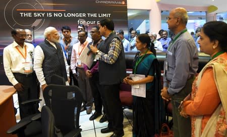 India's Prime Minister Narendra Modi interacts with the scientists of Indian Space Research Organisation (ISRO) at its headquarters in Bengaluru