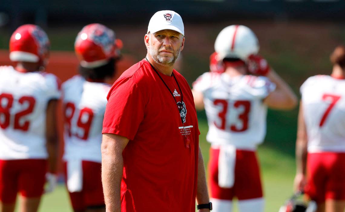 N.C. State head coach Dave Doeren watches during the Wolfpack’s first practice of fall camp in Raleigh, N.C., Wednesday, August 3, 2022.