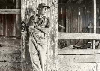 A picture of third generation farmer Chester Simpson hangs in a prominent place at Simpson’s Meats, Wednesday, Jan 19, 2022.