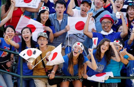 Jul 1, 2015; Edmonton, Alberta, CAN; Japan fans cheer after Japan defeated England in the semifinals of the FIFA 2015 Women's World Cup at Commonwealth Stadium. Mandatory Credit: Erich Schlegel-USA TODAY Sports