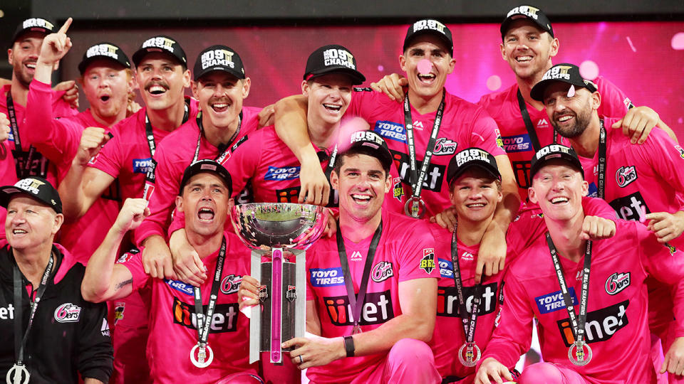 2019/20 Big Bash winners the Sydney Sixers are seen here celebrating their title.