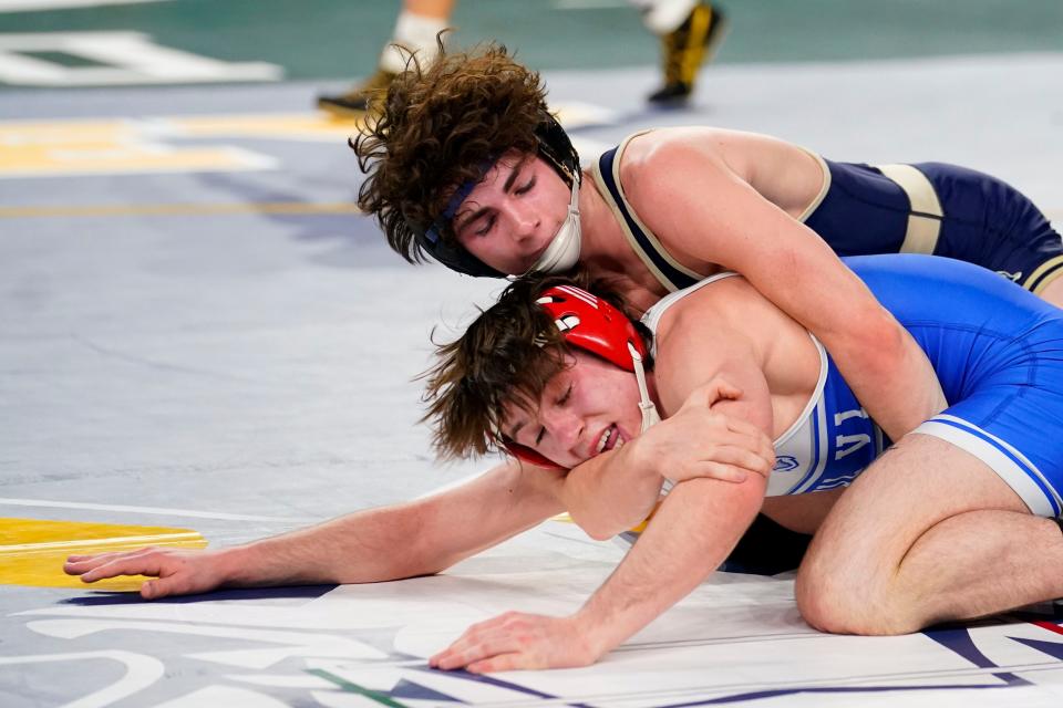 Christian Fojon of Ramsey, top, wrestles Branden Palcko of Paul VI in a 138-pound bout on day one of the NJSIAA state wrestling tournament in Atlantic City on Thursday, March 2, 2023.