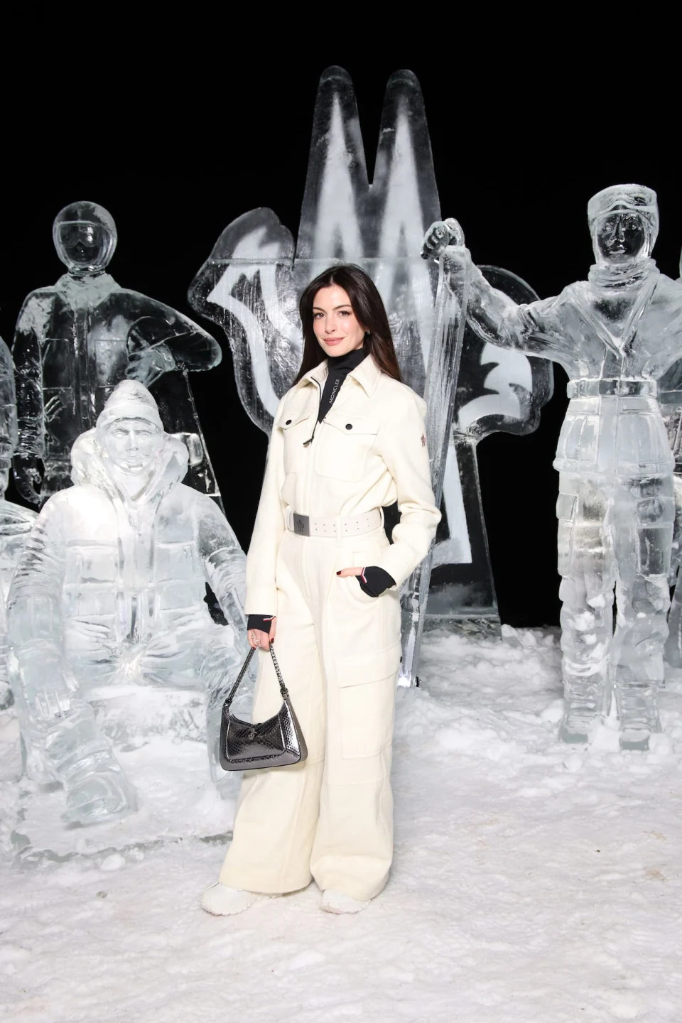 Anne Hathaway attends a Moncler fashion show in Moritz, Switzerland.