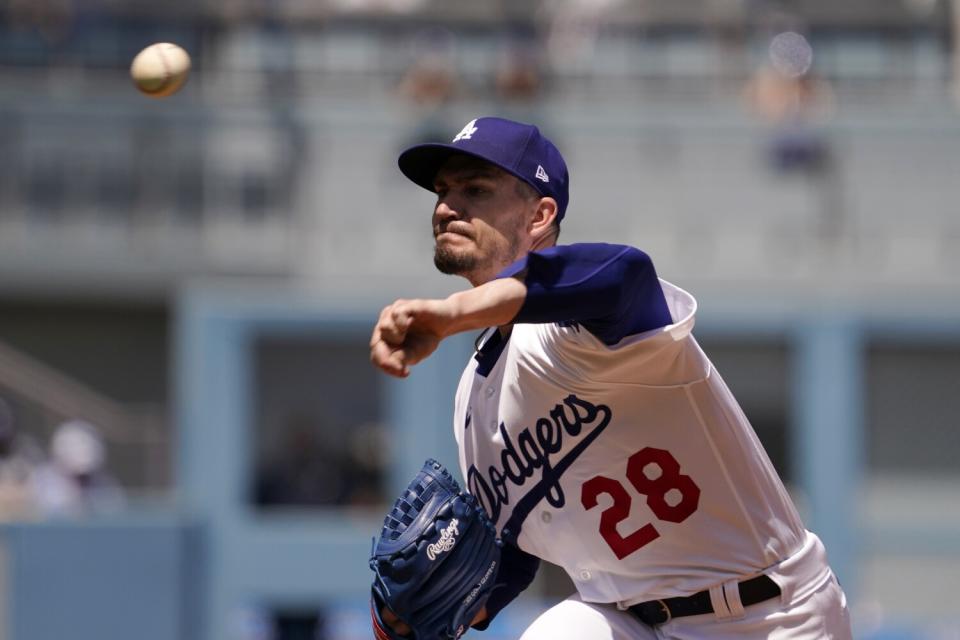 Dodgers starting pitcher Andrew Heaney throws against the Cincinnati Reds on April 17.