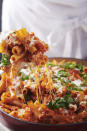 This image shows a recipe for Chicken Parmesan Baked Ziti. More people are cooking at home these days, and when they do eat restaurant food, they’re often looking for comfort food, experts say. Other trends include simpler recipes, recipes with fewer ingredients, one-pot meals, sheet-pan meals, finger food and pantry-ingredient recipes, all up significantly year over year. (Cheyenne M. Cohen/Katie Workman via AP)