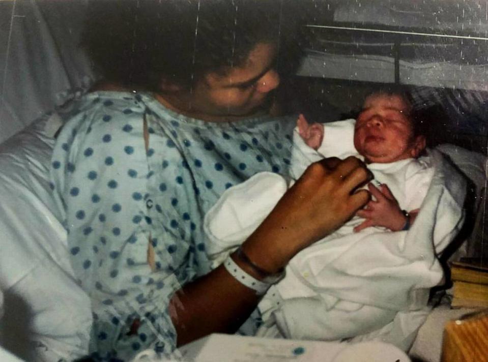 Brandi Henderson holds her son Tyrece not long after his birth. Ten months later, on March, 9, 1994, Henderson was raped and strangled in her home by serial killer Henry Louis Wallace. Wallace also choked Tyrece, but the boy survived. Photo courtesy of Tyrece Woods.