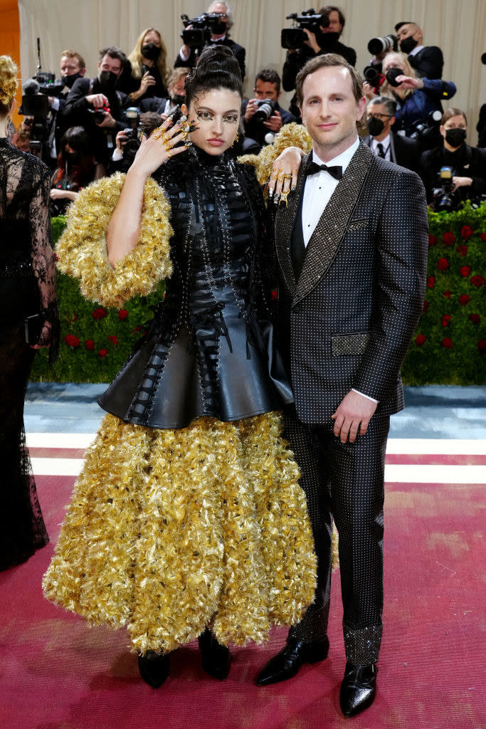 Isabelle Boemeke and Joe Gebbia pose together on the red carpet
