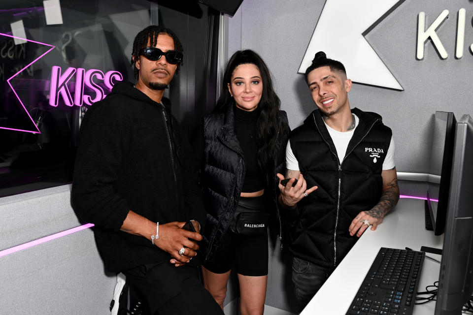 Fazer, Tulisa and Dappy of N-Dubz pose for a photo during a visit Kiss FM on May 16, 2022 in London, England. (Photo by Kate Green/Getty Images for Bauer Media )