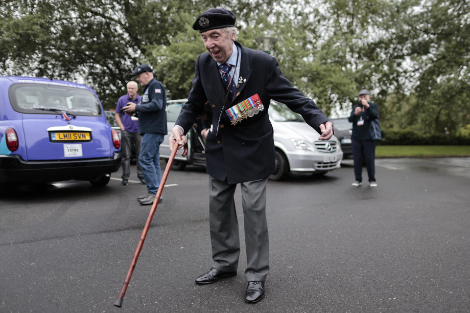 British veteran Peter Kent of the Royal Navy arrives to the ceremony at Pegasus Bridge, in Ranville, Normandy, Sunday, June, 5, 2022. On Monday, the Normandy American Cemetery and Memorial, home to the gravesites of 9,386 who died fighting on D-Day and in the operations that followed, will host U.S. veterans and thousands of visitors in its first major public ceremony since 2019. (AP Photo/Jeremias Gonzalez)