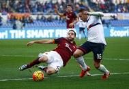 Football Soccer - AS Roma v Genoa - Italian Serie A - Olympic Stadium, Rome, Italy - 20/12/15. AS Roma's Kostas Manolas (L) and Genoa's Diego Capel in action. REUTERS/Tony Gentile