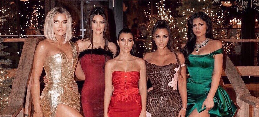 The Kardashian sisters pose for their Christmas 2019 party photo