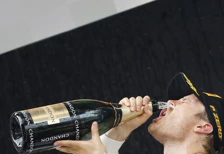 Formula One - Chinese F1 Grand Prix - Shanghai, China - 17/4/16 - Mercedes Formula One driver Nico Rosberg of Germany celebrates after the Chinese Grand Prix. REUTERS/Aly Song