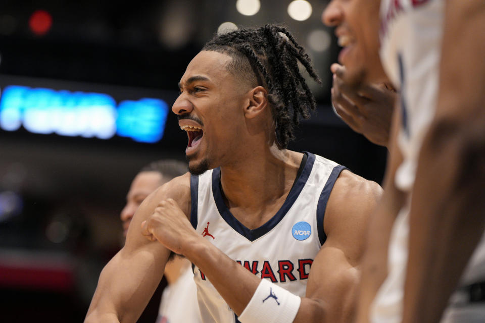 Howard's Elijah Williams, center, reacts to a foul called on a Wagner player during the first half of a First Four college basketball game in the men's NCAA Tournament on Tuesday, March 19, 2024, in Dayton, Ohio. (AP Photo/Jeff Dean)