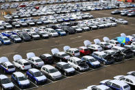 Volkwagen cars are seen with their bonnets up after Greenpeace volunteers gained access to the vehicle park at the port of Sheerness, Britain, September 21, 2017. Jiri Rezac/Greenpeace handout via REUTERS