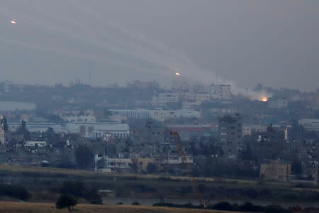 Trails are seen as rockets are launched from Gaza towards Israel as seen from the Israeli side of the Israel-Gaza border, Israel May 5, 2019 REUTERS/ Amir Cohen