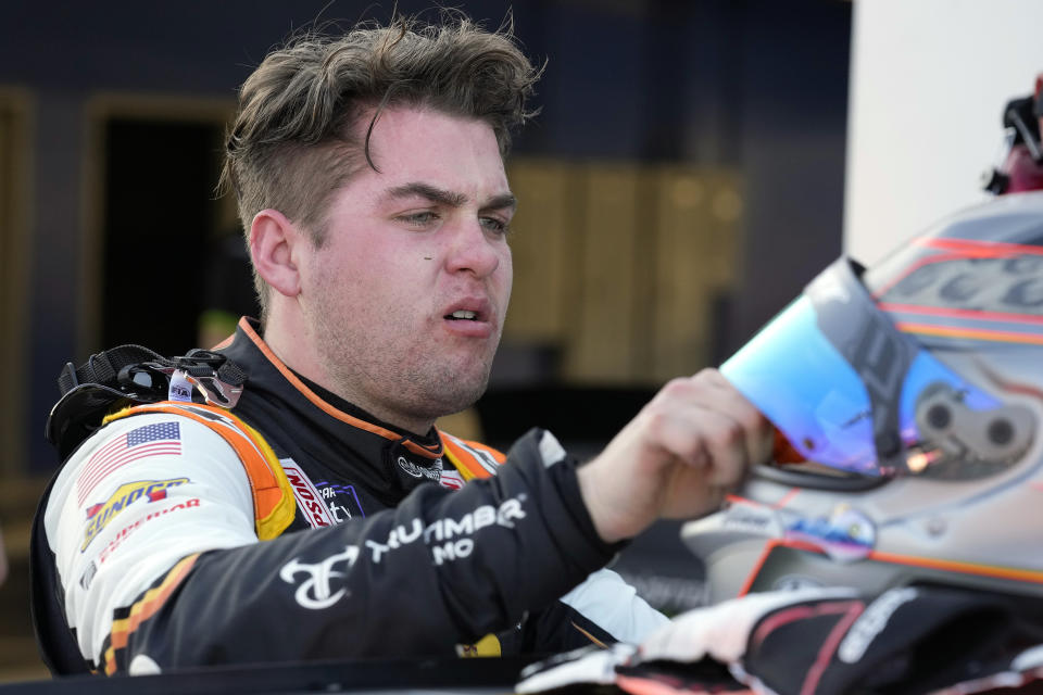 FILE - Noah Gragson takes off his helmet after a NASCAR Xfinity Series auto race practice Friday, Feb. 18, 2022, at Daytona International Speedway in Daytona Beach, Fla. The star Xfinity Series driver for JR Motorsports is in the spotlight again for all the wrong reasons: the poor choices he’s making on track that are slowing Gragson’s career progression. (AP Photo/Chris O'Meara, File)