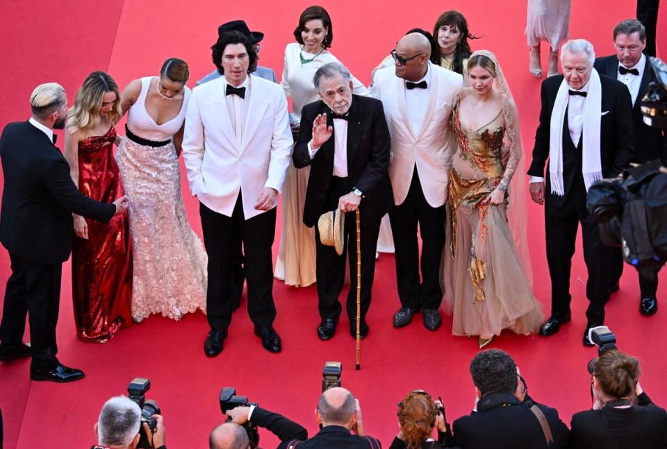 The cast arrive on the red carpet (AFP via Getty Images)