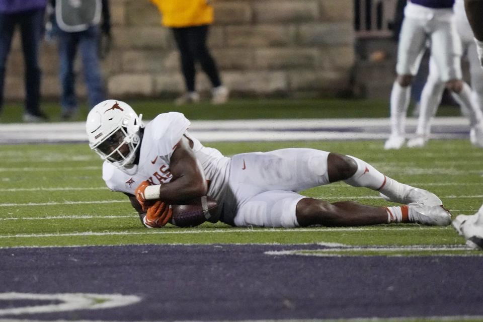 Texas linebacker Jaylan Ford recovers a Kansas State fumble in the final minute of the Longhorns' 34-27 win in Manhattan, Kan., on Nov. 5. Ford earned Big 12 defensive player of the week honors for his performance.