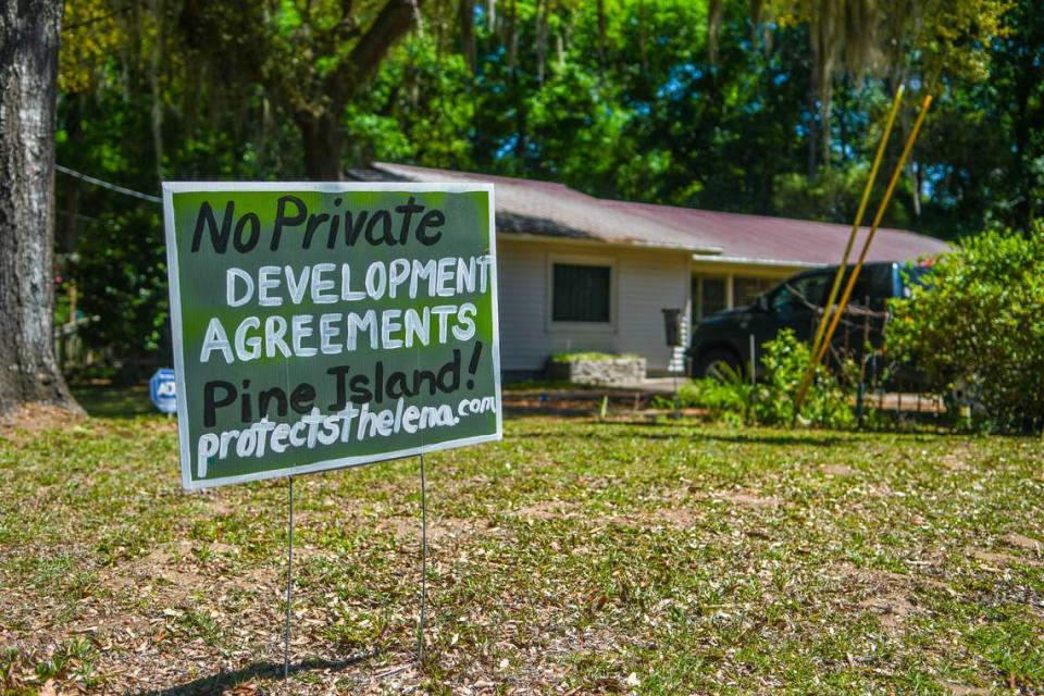 Yard signs are prevalent denouncing the proposed development of Pine Island into a gated, golf course community in this photo taken on April 12, 2023 on St. Helena Island.