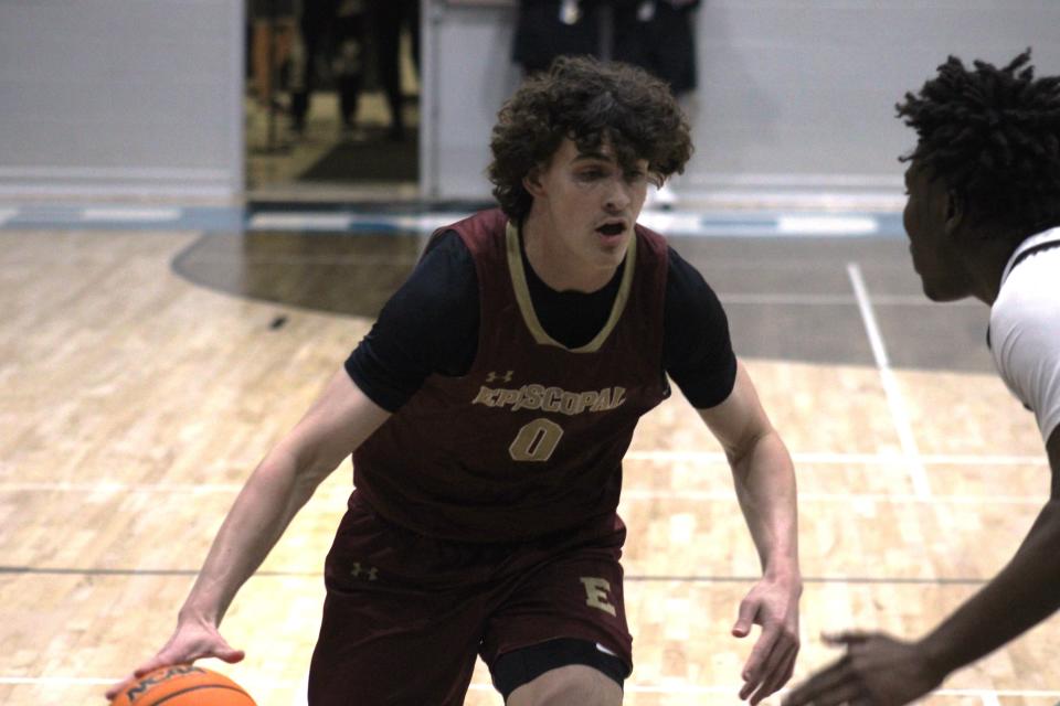 Episcopal center Grady Schwartz (0) dribbles against Providence.