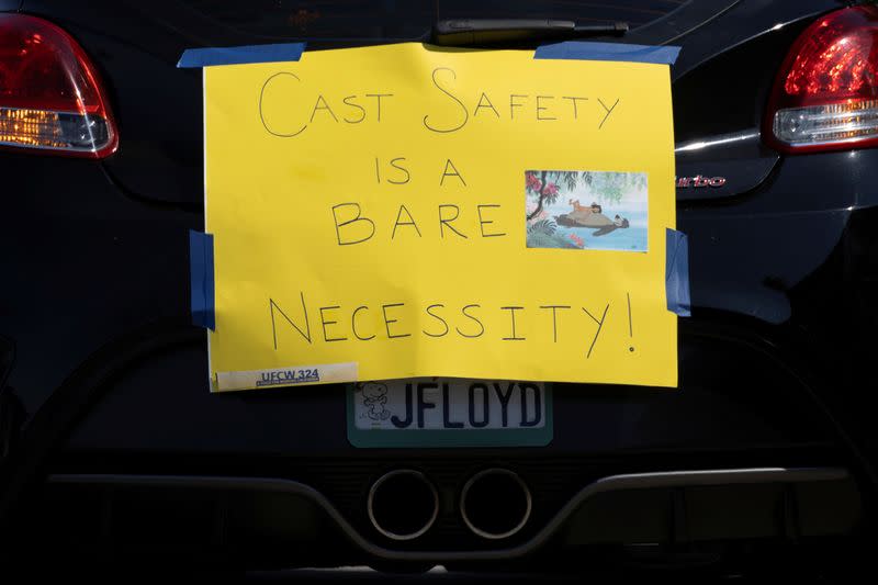 Disney cast members stage a car caravan outside Disneyland California, calling for higher safety standards for Disneyland to reopen