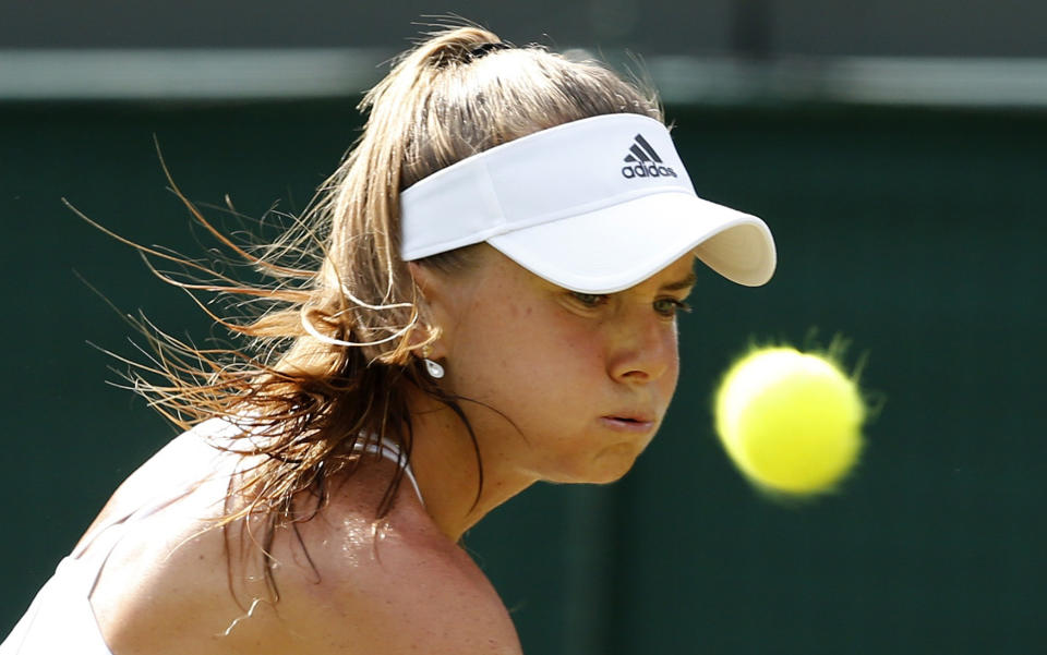 Daniela Hantuchova of Slovakia heeps her eye on the ball during her match against Heather Watson of Britain at the Wimbledon Tennis Championships in London, July 1, 2015. REUTERS/Suzanne Plunkett
