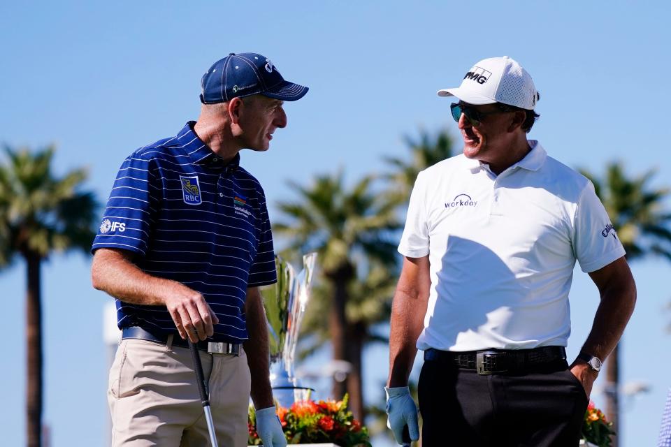 Jim Furyk (left) and Phil Mickelson talk on the first tee of the 2021 Schwab Cup Championship. Both played on the 1999 U.S. Ryder Cup team at The Country Club in Brookline, Mass., the site of this week's U.S. Open.