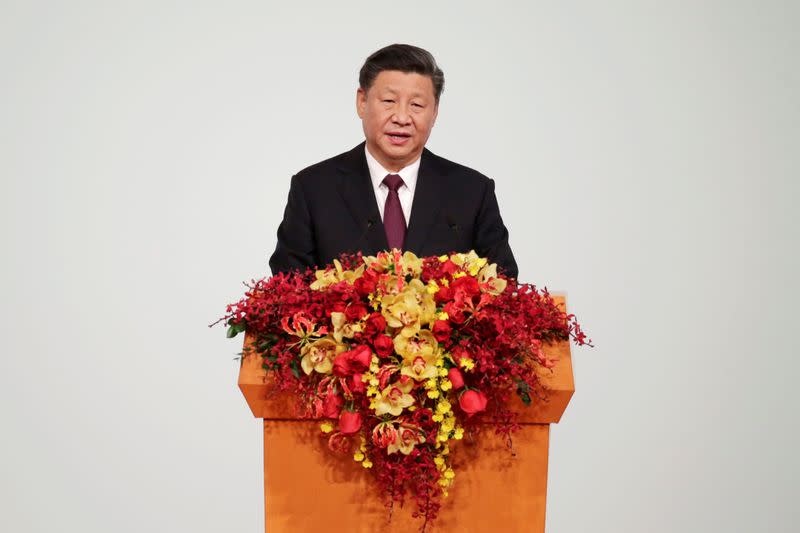 FILE PHOTO: Chinese President Xi Jinping speaks at a ceremony on the 20th anniversary of the former Portuguese colony's return to China in Macau