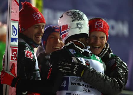 Ski Jumping - Ski Flying World Championships - team final round - Oberstdorf, Germany - January 21, 2018. Andreas Stjernen, Johann Andre Forfang, Daniel Andre Tande and Robert Johansson of team Norway celebrate winning the gold medal. REUTERS/Michael Dalder