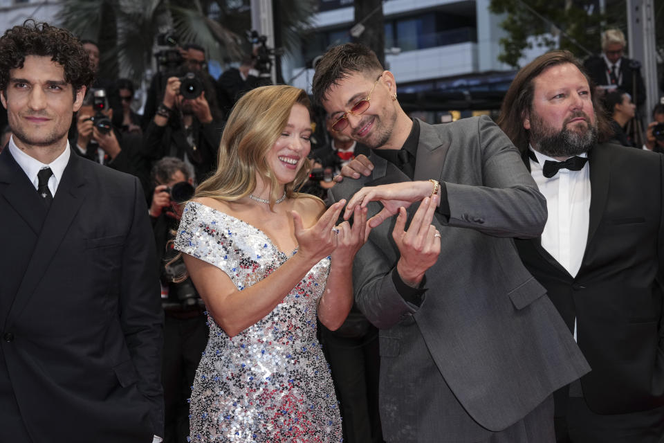 Louis Garrel, from left, Lea Seydoux, Raphael Quenard, and Manuel Guillot pose for photographers upon arrival at the awards ceremony and the premiere of the film 'The Second Act' during the 77th international film festival, Cannes, southern France, Tuesday, May 14, 2024. (Photo by Scott A Garfitt/Invision/AP)