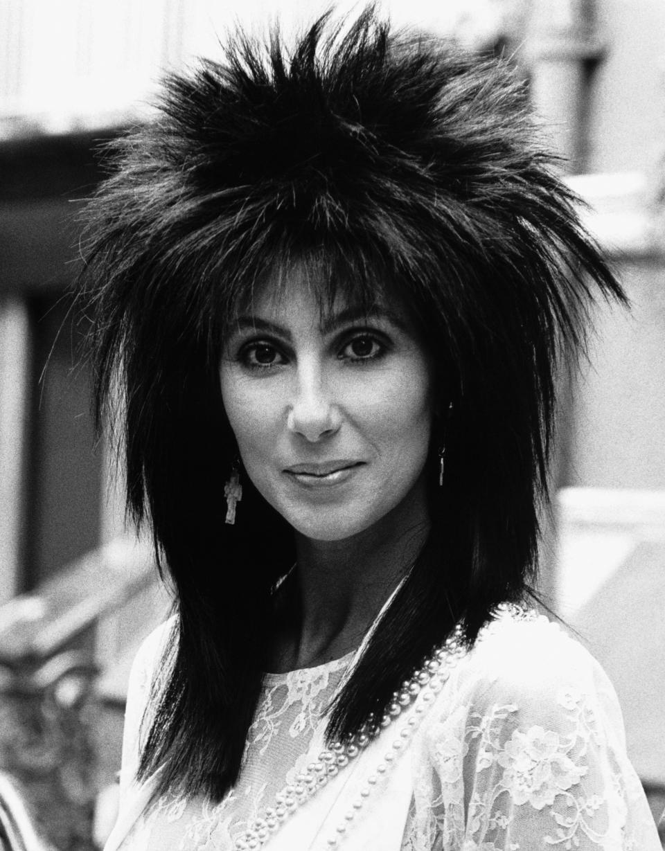 (Original Caption) Cher Arrives In London, 1985. American singer/actress Cher has arrived in London to promote her latest film 'Mask' in which she plays a mother struggling against the problems of bringing up a deformed child. (Photo by ï¿½ Hulton-Deutsch Collection/CORBIS/Corbis via Getty Images)