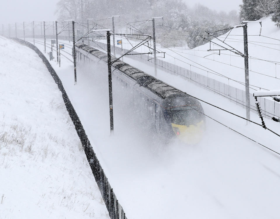 <p>Train passes through Kent near Maidstone during a snowstorm on it’s way to London Terminus. Rail travellers have also been warned of cancellations and delays to services operated by TfL Rail, London Overground, c2c, Southeastern, Greater Anglia, Virgin Trains, Southern, South Western Railway and ScotRail. (Rex) </p>