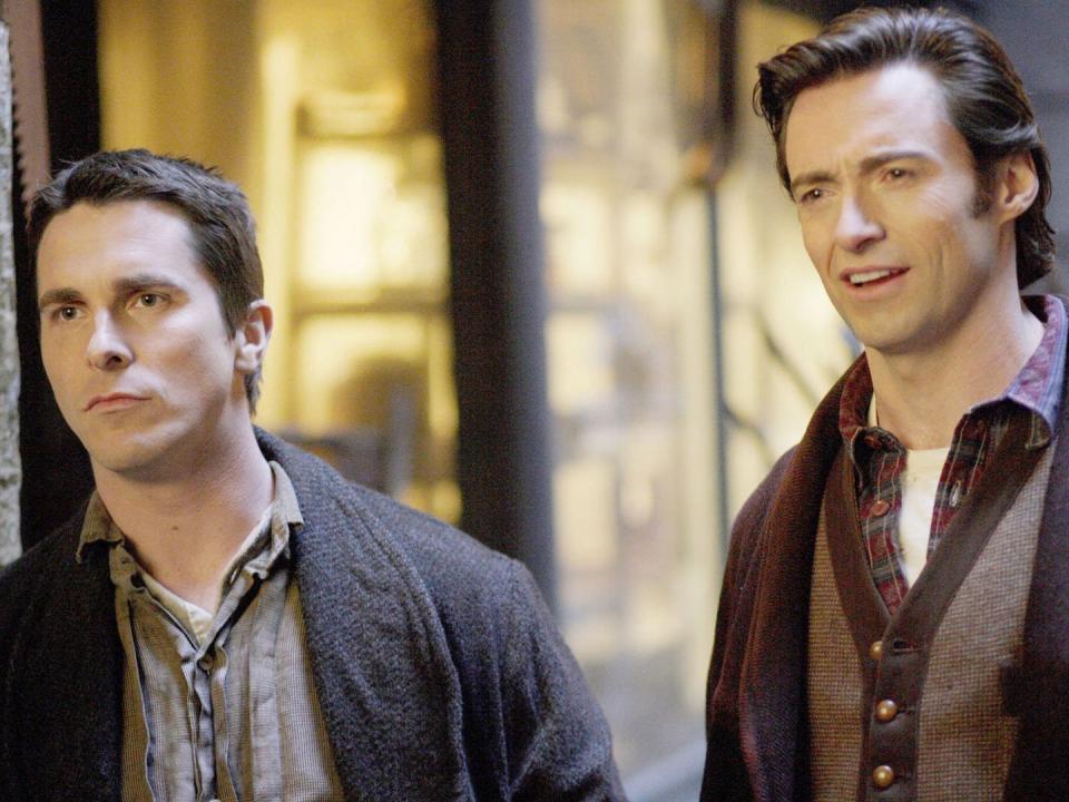 Christian Bale as Alfred Borden, and Hugh Jackman as Robert Angier in "The Prestige."