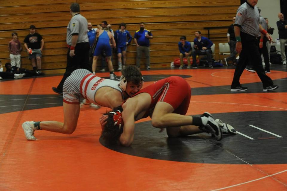 Bellefonte’s Noah Weaver (left) looks to score on Westmont Hilltop’s David Ray in their 145-pound quarterfinals match of the Laurel Highlands Athletic Conference tournament on Friday at Tyrone. Weaver beat Ray, 2-1 in rideouts.