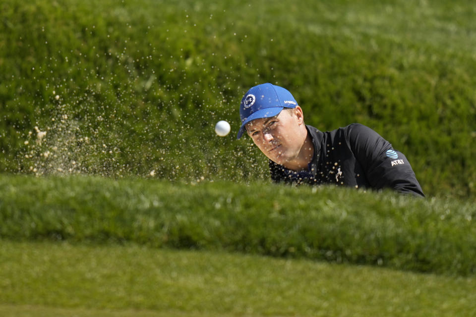 Jordan Spieth hits from the bunker on the 13th hole during the first round of the PGA Championship golf tournament at Oak Hill Country Club on Thursday, May 18, 2023, in Pittsford, N.Y. (AP Photo/Seth Wenig)