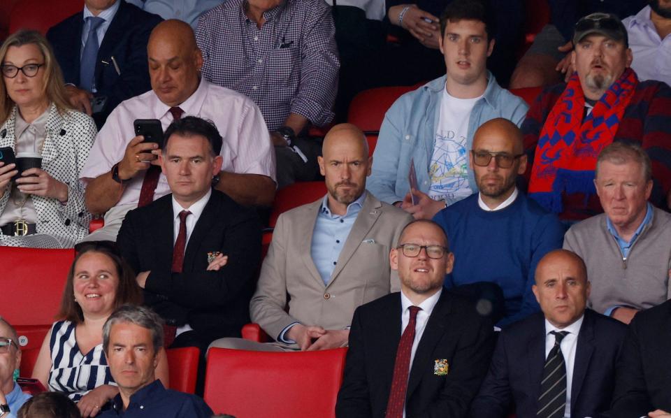 New Manchester United manager Erik ten Hag, Mitchell van der Gaag, director of football John Murtough and Steve McClaren in the stands - Action Images