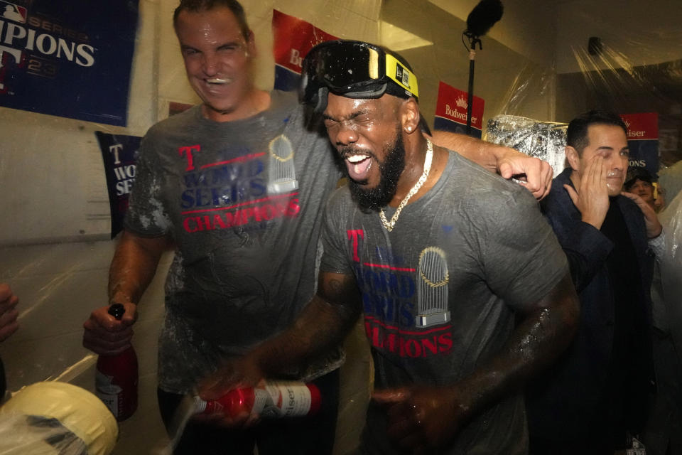 Texas Rangers' Adolis Garcia celebrates after Game 5 of the baseball World Series against the Arizona Diamondbacks Wednesday, Nov. 1, 2023, in Phoenix. The Rangers won 5-0 to win the series 4-1. (AP Photo/Godofredo A. Vásquez)