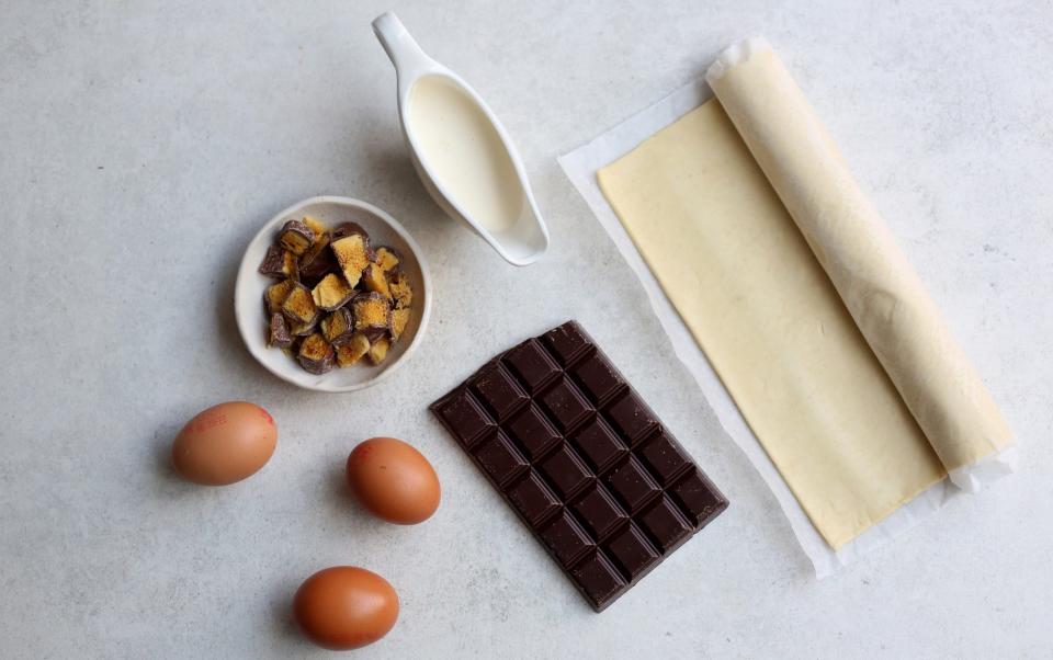 View of the five ingredients needed to make Silvana Franco's recipe for honeycomb chocolate tart
