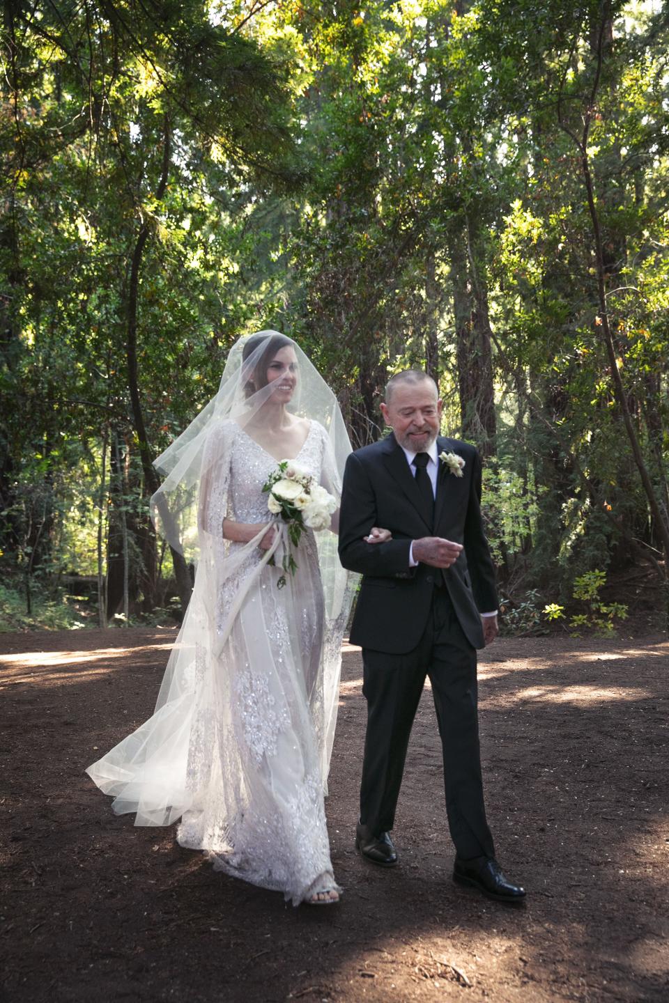 The actress and producer married the man of her dreams beneath a family of 800-year-old trees. Afterwards, the newlyweds surprised their guests with a Fred Astaire and Ginger Rogers–style tap routine and ended the night riding back to their rooms on bicycles decorated Burning Man–style with LED lights.