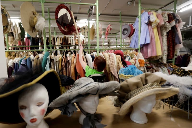 FILE PHOTO: An employee works in a costume and props storage of the Barrandov Studio in Prague