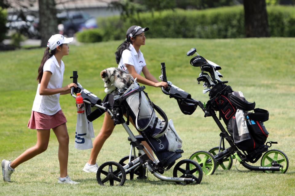 Ursuline's Nina Choe, left, and Scarsdale's Emma Lee during the final round of the Section 1 girls golf tournament at the Whippoorwill Club in Armonk May 24, 2023. 