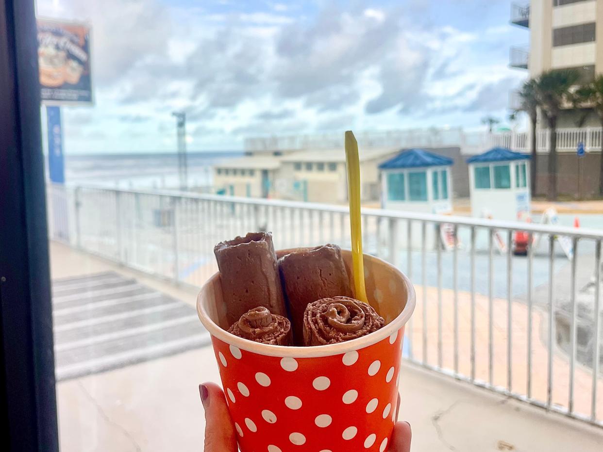 Chocolate and TenneSteve Trash Cookie Dough rolled ice cream from TenneSteve Trash in Daytona Beach.