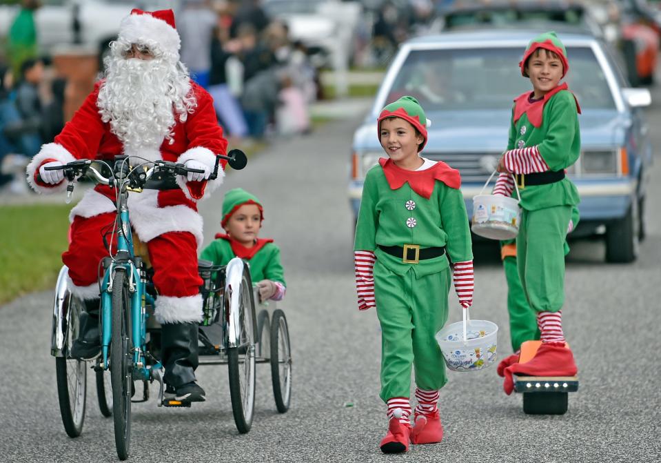 An annual Christmas Day parade, pictured here in 2022, is held in Sarasota's Pinecraft neighborhood.